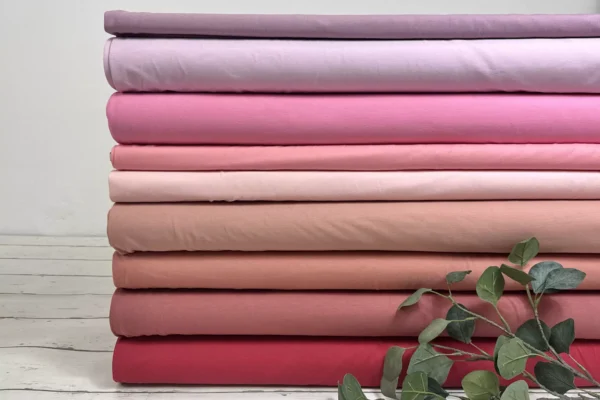 Jersey Stoff in Uni rosa und apricot Farben