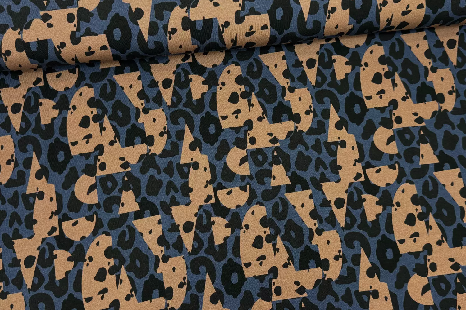French Terry Stoff mit Leoprint Muster in dunkelblau. Von Swafing Stella by Cherry Picking