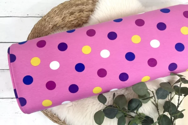 French Terry Stoff mit großen und bunten Punkten in pink