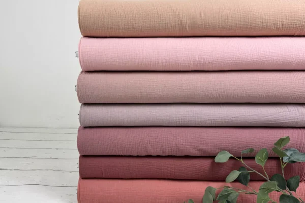 Musselin Stoff in den uni Farben rosa, pfirsich und apricot